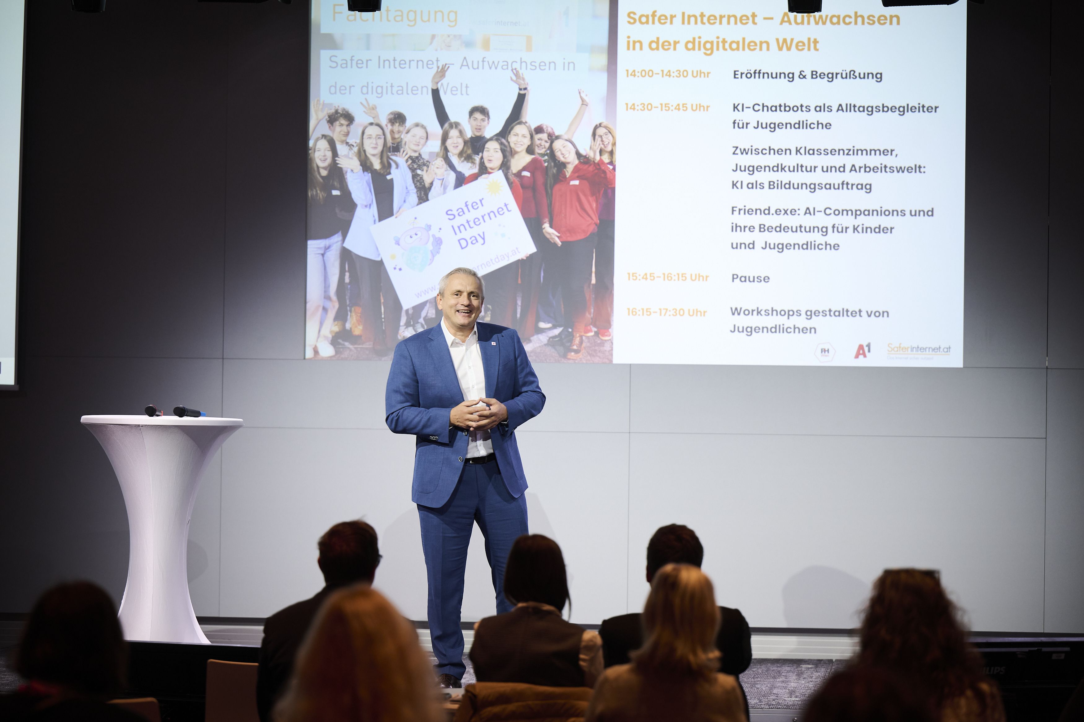 A1 CEO giving a speech on stage