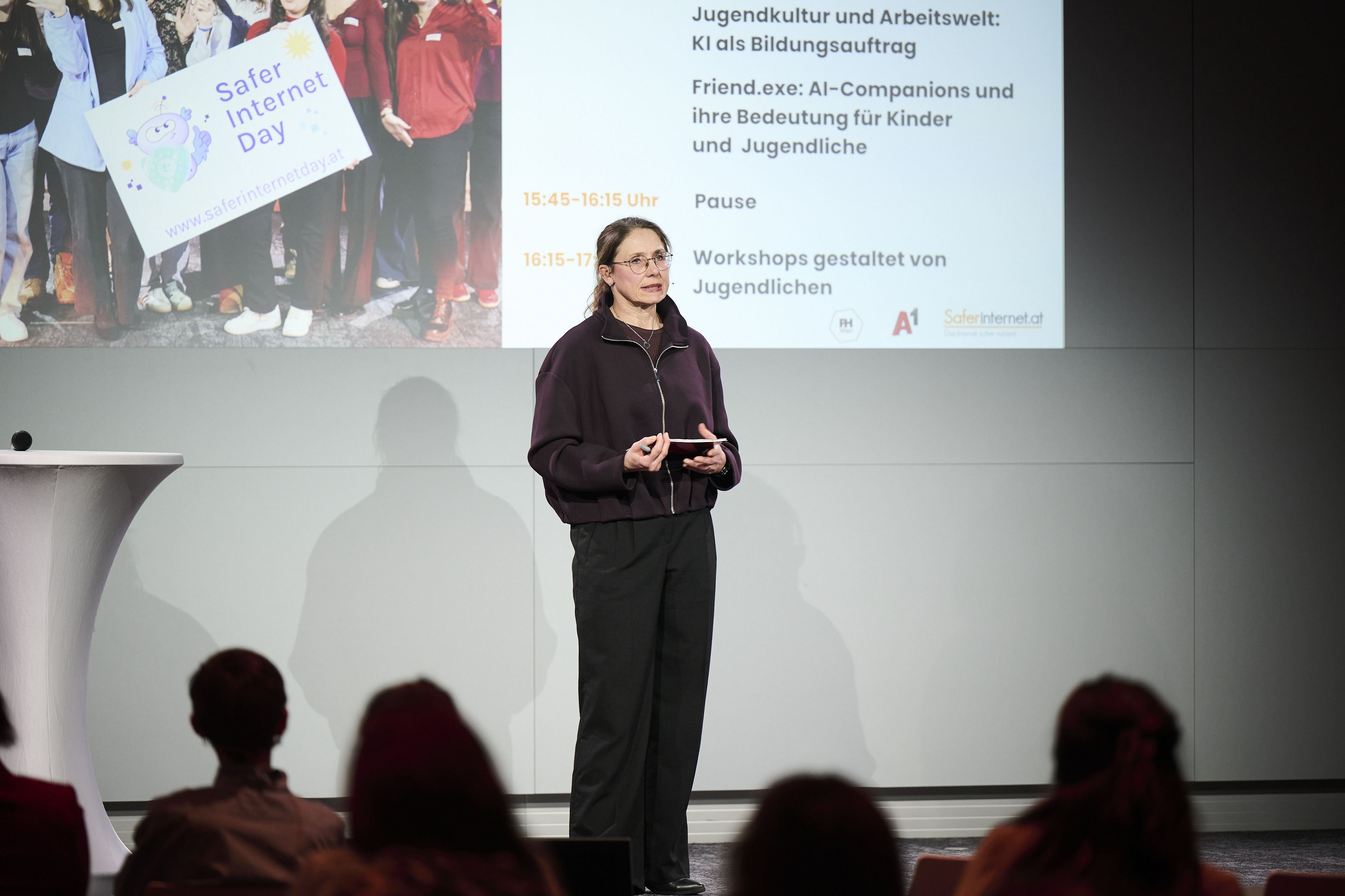 Michaela giving her presentation on stage