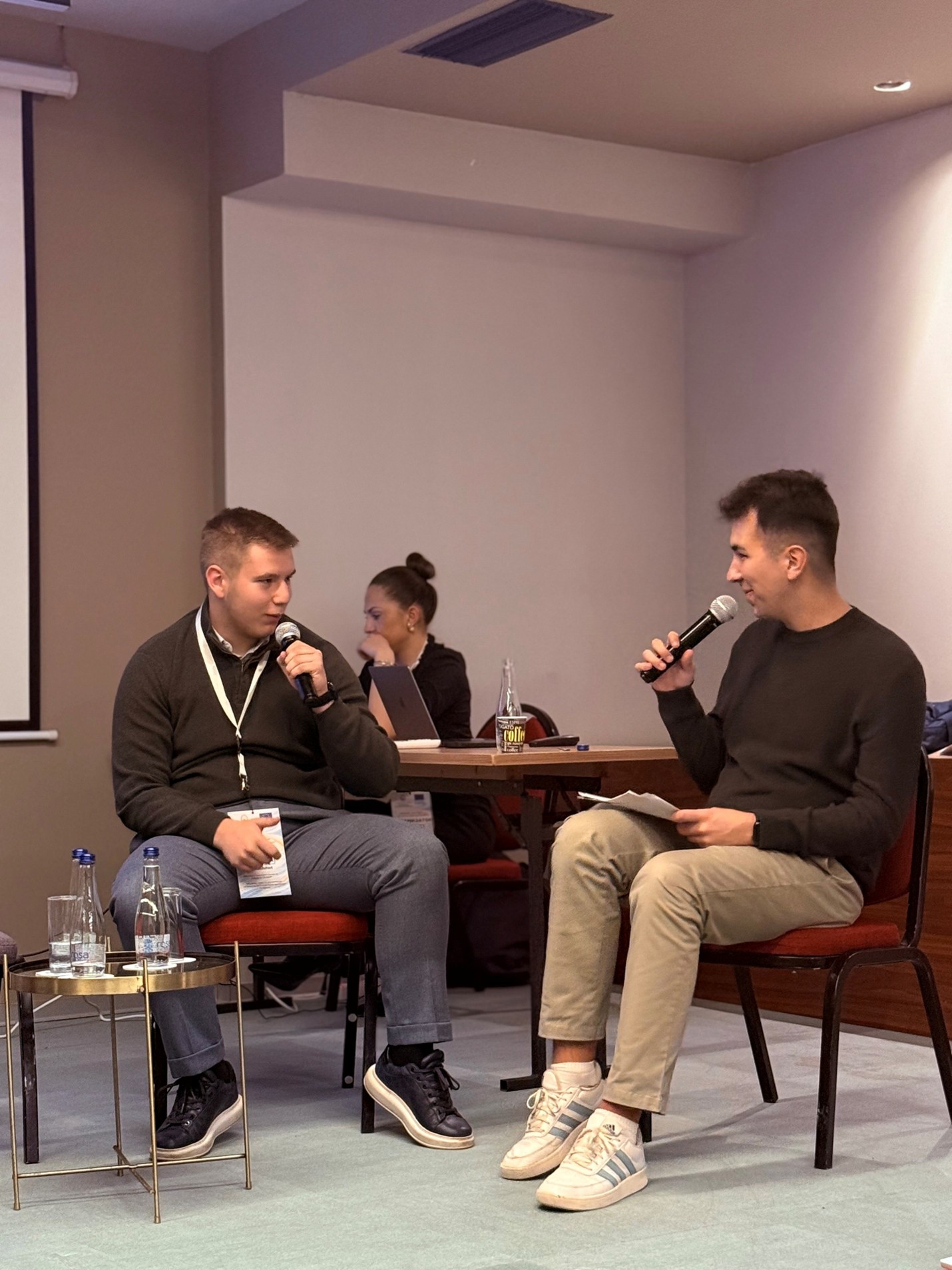 Two young boys discussing online safety topics at the event