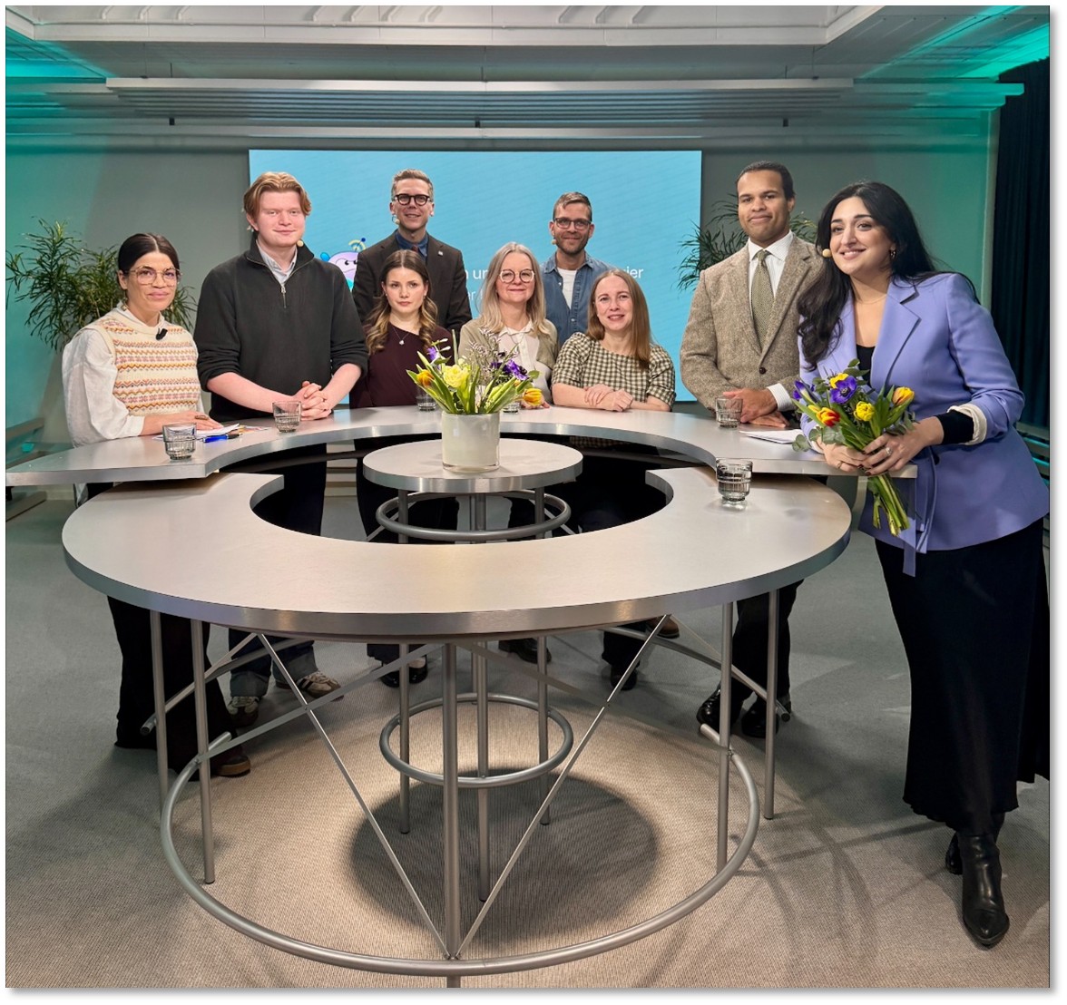 Group picture of all speakers and participants of the live event