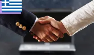 Two shaking hands of businessmen