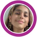 A headshot of Manahil