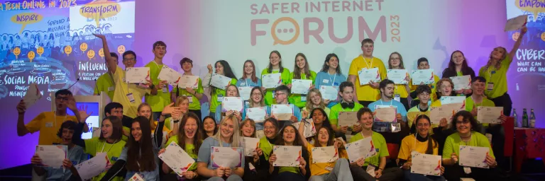 A group picture of young people participating at Safer Internet Forum 2023