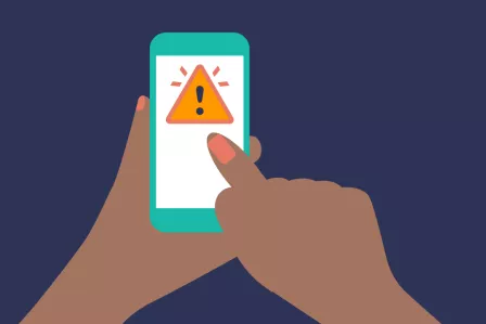 Two hands holding a smartphone and tapping.