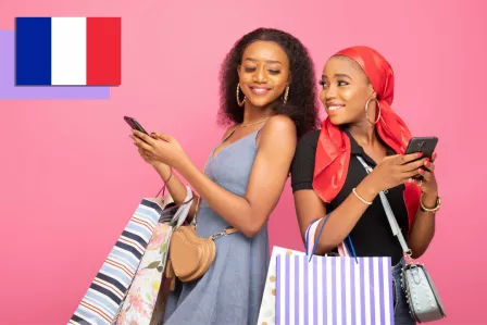 Teenage girls shopping with their phones