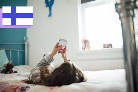A child playing on her phone.
