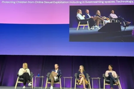 Workshop session, onsite panel with four panellists sitting on chairs.