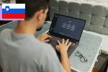 A young student using ChatGPT on a laptop