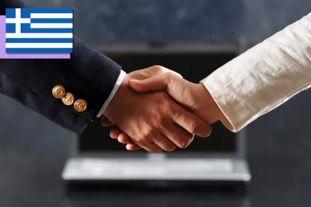 Two shaking hands of businessmen