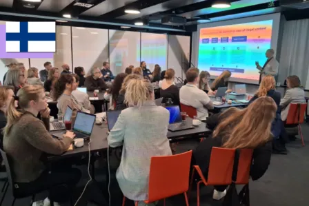 Group of experts from Nordic countries' SICs having a meeting in a large conference room