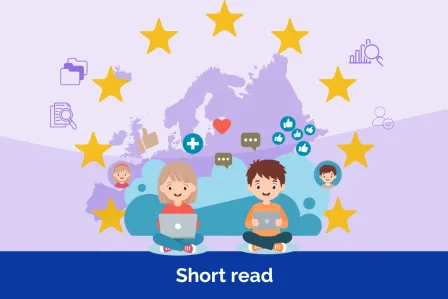 The EU flag on the background with two children using laptops