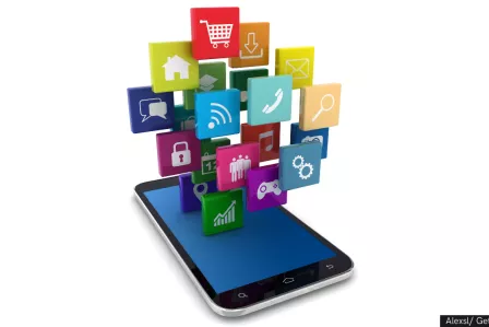 Smartphone with social media icons popping up from the screen