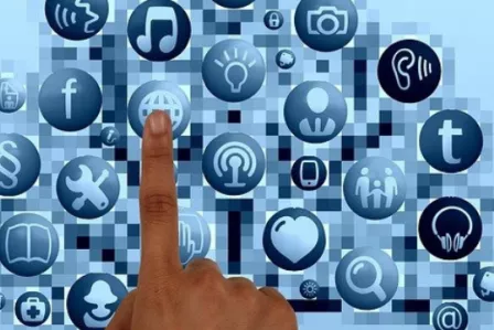 Finger selecting icons on a screen