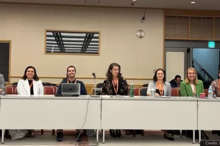 Conference panel sitting at a table