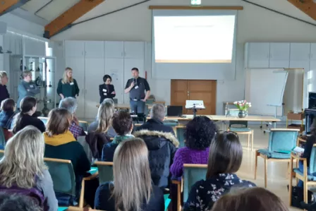 Rear view of adults in a workshop setting at the Luxembourg Safer Internet Day event
