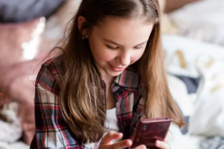 Girl looking at a mobile device