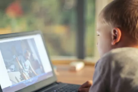 Child looking at computer screen