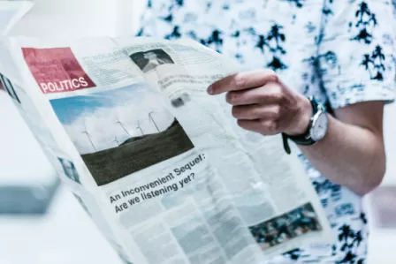 Man with newspaper in his hands