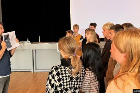 person presenting educational material to young people