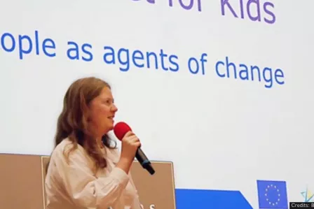 Girl talking with a mic in her hands