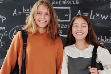 Students in front of a blackboard