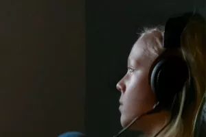 Photo of a child with gaming headphones