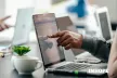 Hand pointing at a laptop screen with INHOPE logo superimposed