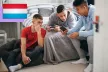 Teenage boys using a smartphone.