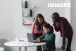 A group of three young people observing data on a laptop screen