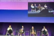 Workshop session, onsite panel with four panellists sitting on chairs.