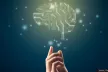 Hand touching an artificial brain