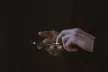 A hand holding a phone