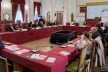 People sitting around a table at a conference