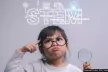 Girl with glasses holding a magnifying glass