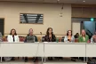 Conference panel sitting at a table