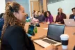 Colleagues meeting around a table