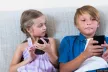 Children looking at their phone