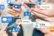 People holding multiple phones