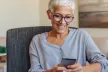Middle-aged woman using a mobile device