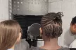 Young people recording a podcast in front of a microphone