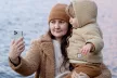 Mother taking a selfie with a young child