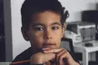 Young boy looking thoughtful