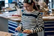 A young girl working on a tablet at the SID event in Luxembourg