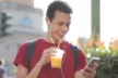 Teenager walking while texting