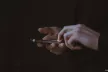 Photo of person holding a smartphone