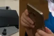 A small child looking at a screen
