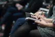Woman writing on notepad