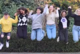 Young people jumping in the park