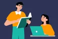 A teacher holding a book and a female student using a laptop