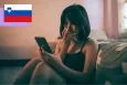 Girl crying while looking at her phone